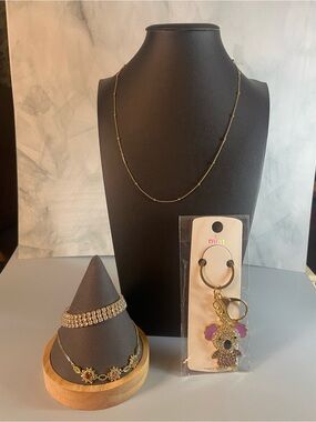 4 piece set of sparkly jewelry with keychain or bag charm